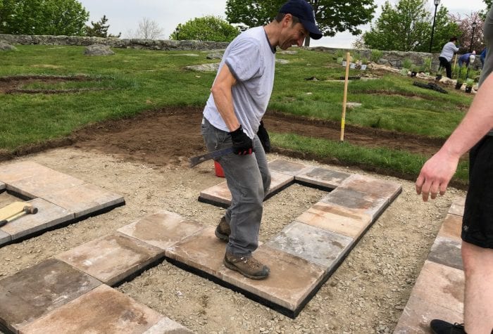 Jeff happily setting the final paver