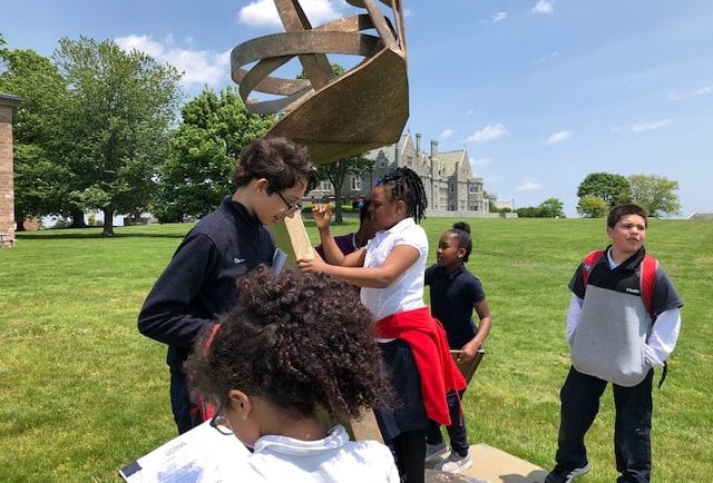 Students enjoy interacting with art on a scavenger hunt